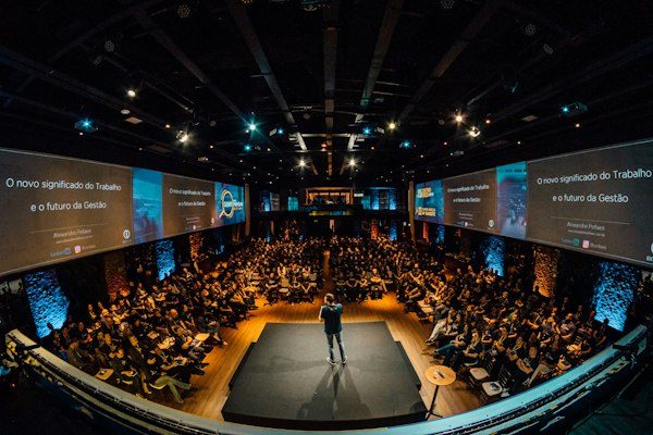 Leader engaging confident audience in boardroom